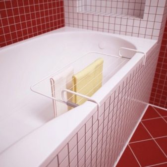 Сушарки для білизни у ванну кімнату: настінні і стельові, мотузки для сушіння і складні, ліани і вішалки. Особливості опускаються і розсувних моделей