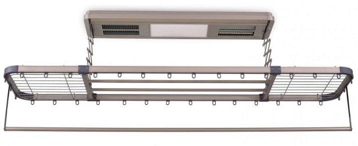 Сушарки для білизни у ванну кімнату: настінні і стельові, мотузки для сушіння і складні, ліани і вішалки. Особливості опускаються і розсувних моделей