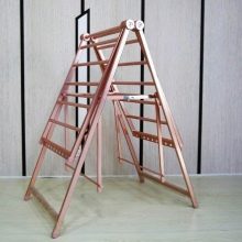 Сушарки для білизни у ванну кімнату: настінні і стельові, мотузки для сушіння і складні, ліани і вішалки. Особливості опускаються і розсувних моделей