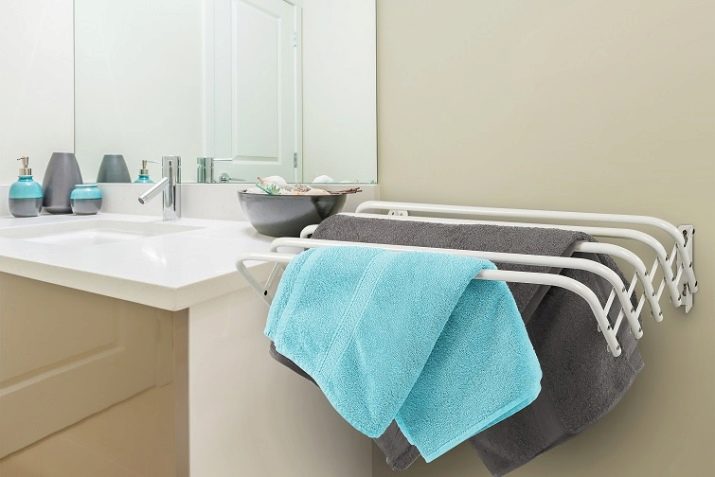 Сушарки для білизни у ванну кімнату: настінні і стельові, мотузки для сушіння і складні, ліани і вішалки. Особливості опускаються і розсувних моделей