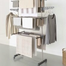 Сушарки для білизни у ванну кімнату: настінні і стельові, мотузки для сушіння і складні, ліани і вішалки. Особливості опускаються і розсувних моделей