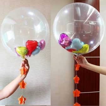 Сюрприз з повітряних куль (23 фото): як зробити ідеальний подарунок? Як красиво упакувати гелієві кулі в коробку? Як зробити повітряну кулю з сюрпризів всередині?