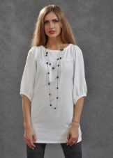 Трикотажні туніки (176 фото): фасони жіночих тунік з трикотажу, турецькі туніки, ошатні, домашні, з довгим рукавом