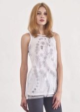 Трикотажні туніки (176 фото): фасони жіночих тунік з трикотажу, турецькі туніки, ошатні, домашні, з довгим рукавом