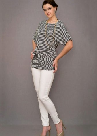 Трикотажні туніки (176 фото): фасони жіночих тунік з трикотажу, турецькі туніки, ошатні, домашні, з довгим рукавом