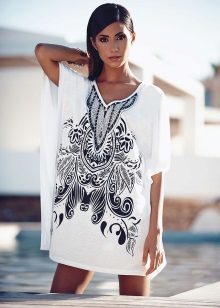 Трикотажні туніки (176 фото): фасони жіночих тунік з трикотажу, турецькі туніки, ошатні, домашні, з довгим рукавом