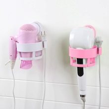 Тримач для фена у ванну кімнату: в вигляді підставки, настінний і інші варіанти. Моделі Escala від Axentia, IKEA та інших брендів