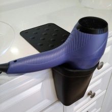 Тримач для фена у ванну кімнату: в вигляді підставки, настінний і інші варіанти. Моделі Escala від Axentia, IKEA та інших брендів