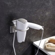 Тримач для фена у ванну кімнату: в вигляді підставки, настінний і інші варіанти. Моделі Escala від Axentia, IKEA та інших брендів