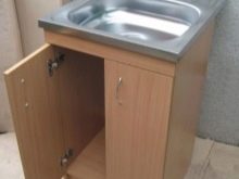 Тумби під мийку на кухню (45 фото): шафи під раковину з розмірами 60х80 та 50х60 см, вибір підлогових кухонних тумбочок