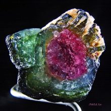 Турмалін (57 фото): лікувальні та інші властивості каменю, його значення для людини. Дія мінералу на організм. Опис зеленого каменю і турмаліну інших кольорів