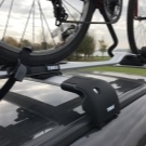 Велокріплення Thule: вибираємо кріплення для велосипеда на фаркоп і дах машини, особливості автообагажника на задню двері