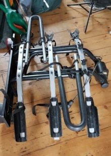 Велокріплення Thule: вибираємо кріплення для велосипеда на фаркоп і дах машини, особливості автообагажника на задню двері