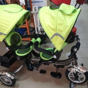 Велосипед для двійні: дитячий двомісний триколісний велосипед з ручкою для двійнят, моделі з двома кріслами для дітей різного віку