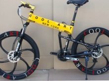 Велосипед на литих дисках (35 фото): плюси і мінуси лиття замість спиць, велосипедні диски Green Bike і Porsche, Audi і Ferrari, відгуки власників