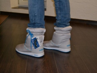 З чим носити жіночі дутики (54 фото): з пальто або курткою, зимові білі і чорні моделі з шубою і сукнею, з пуховиком і спідницею