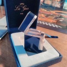 Запальнички у подарунок чоловікові: красиві газові моделі з гравіюванням, особливості вибору