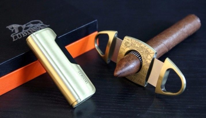 Запальнички у подарунок чоловікові: красиві газові моделі з гравіюванням, особливості вибору
