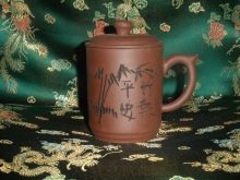 Заварочная гуртка з ситом: як вибрати чашку для заварювання чаю з кришкою і керамічних або порцелянових ситечком?