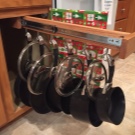 Зберігання сковорідок: вибір підставки. Опис органайзерів і тримачів для зберігання сковорідок на кухні