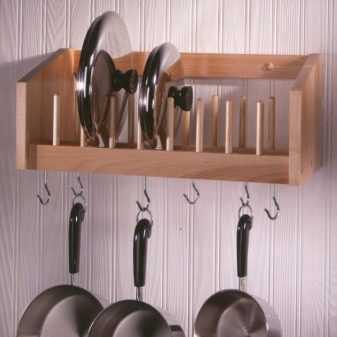 Зберігання сковорідок: вибір підставки. Опис органайзерів і тримачів для зберігання сковорідок на кухні