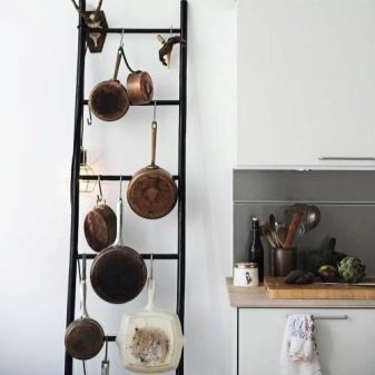 Зберігання сковорідок: вибір підставки. Опис органайзерів і тримачів для зберігання сковорідок на кухні
