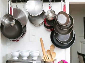 Зберігання сковорідок: вибір підставки. Опис органайзерів і тримачів для зберігання сковорідок на кухні