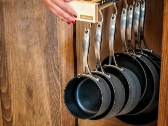 Зберігання сковорідок: вибір підставки. Опис органайзерів і тримачів для зберігання сковорідок на кухні