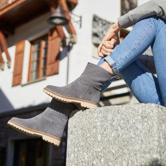 Жіноча зимова взуття Timberland (42 фото): черевики на натуральному хутрі, теплі кросівки та інші. З чим носити їх дівчатам взимку?