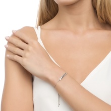 Жіночий браслет з білого золота (78 фото): моделі з жовтим металом з топазами і сапфірами, тонкі і товсті на руку, від Тіффані