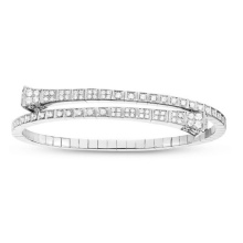 Жіночий браслет з білого золота (78 фото): моделі з жовтим металом з топазами і сапфірами, тонкі і товсті на руку, від Тіффані