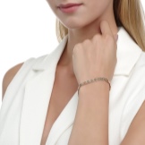 Жіночий браслет з білого золота (78 фото): моделі з жовтим металом з топазами і сапфірами, тонкі і товсті на руку, від Тіффані