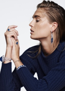 Жіночий браслет з білого золота (78 фото): моделі з жовтим металом з топазами і сапфірами, тонкі і товсті на руку, від Тіффані