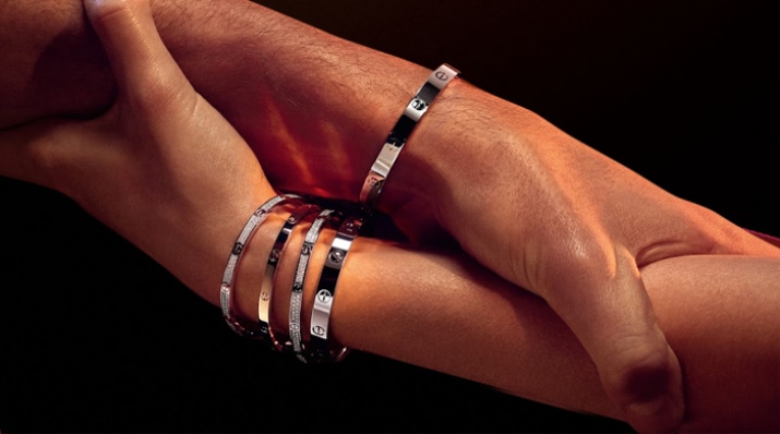 Жіночий браслет з білого золота (78 фото): моделі з жовтим металом з топазами і сапфірами, тонкі і товсті на руку, від Тіффані