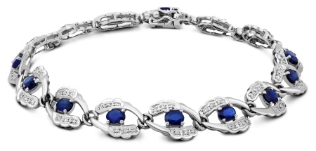 Жіночий браслет з білого золота (78 фото): моделі з жовтим металом з топазами і сапфірами, тонкі і товсті на руку, від Тіффані