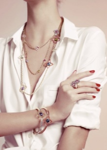 Жорсткий браслет із золота (81 фото): жіночі плоскі моделі на руку з жовтого золота 585 проби, відгуки