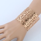 Жорсткий браслет із золота (81 фото): жіночі плоскі моделі на руку з жовтого золота 585 проби, відгуки