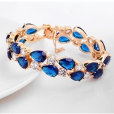 Жорсткий браслет із золота (81 фото): жіночі плоскі моделі на руку з жовтого золота 585 проби, відгуки