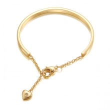 Жорсткий браслет із золота (81 фото): жіночі плоскі моделі на руку з жовтого золота 585 проби, відгуки