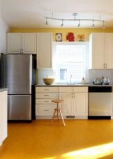 Жовті стіни на кухні (34 фото): шпалери жовтого і лимонного кольору в інтер’єрі. Варіанти дизайну і поєднань