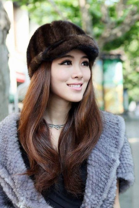 Зимова кепка (71 фото): жіночі хутряні моделі з козирком, бейсболки, з одворотом і вушками, в’язана, з нерпи та шкіри